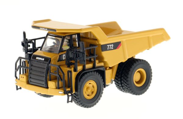 DCM85261 - Dumper CATERPILLAR 772C mit Fahrer und Metallkiste - 1