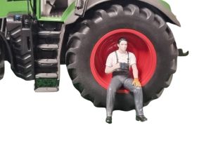 ATLAN32025_GRISF - Sitzender Mann in Pause dunkelgrau